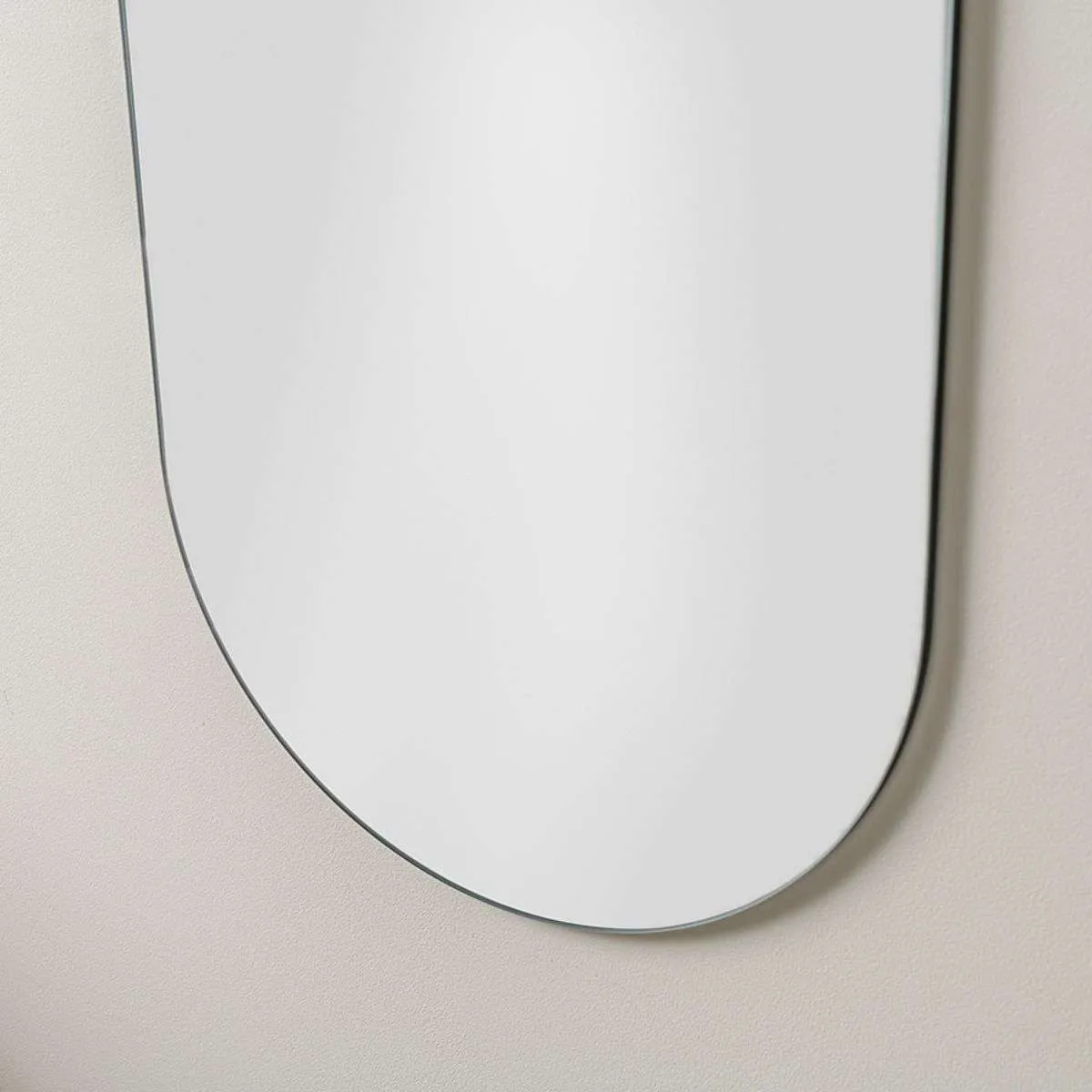 Kalili Frameless Pill Shaped Mirror Mocka